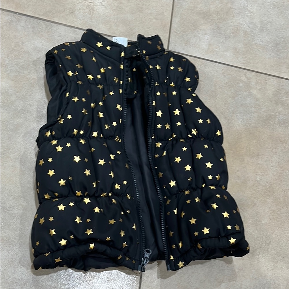 Girls Black and Gold Star puffer Vest, size 5, barely worn